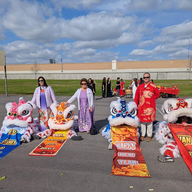 Assistant Principal Jenn Morris, GGUSD Board Trustee Terri Rocco, Principal Nick Clark with the BGHS Lion Dancers 